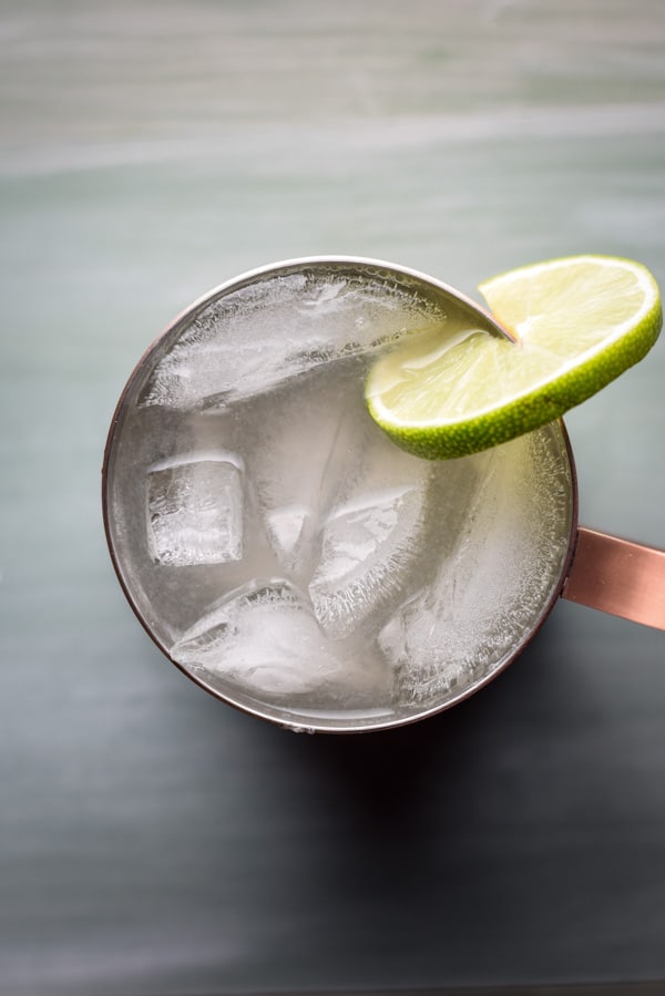 Overhead view of a copper mug filled with the gingery mule