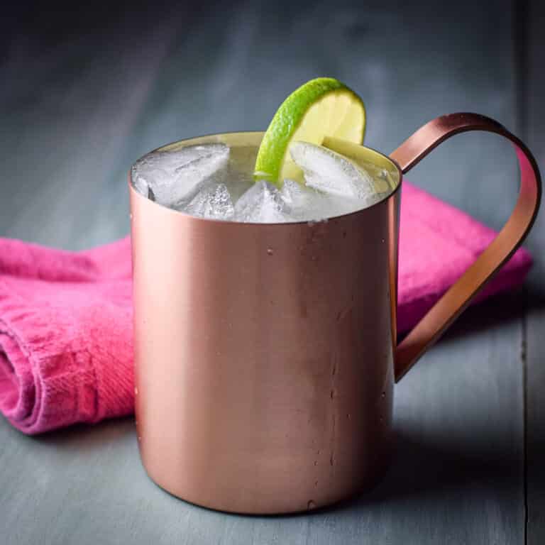 A square photo of a copper mug filled with the mule drink