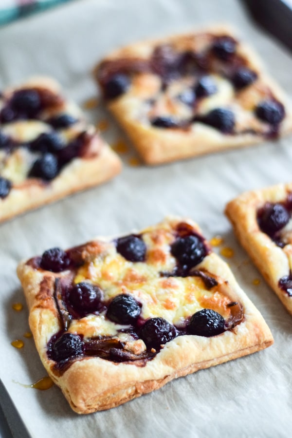 Puff pastry tarts fresh out of the oven but still on the pan