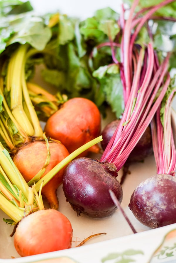 Beets fresh from the store ready to be cooked and the stems to be cut