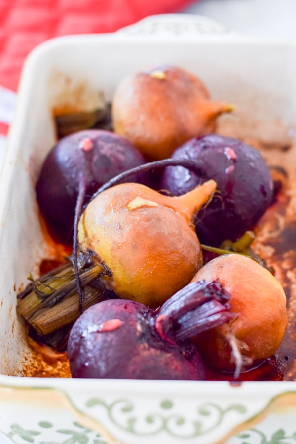 A baking dish with beets straight out of the oven
