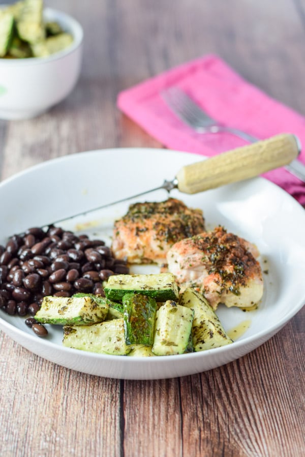 Zucchini, chicken and black beans on a plate