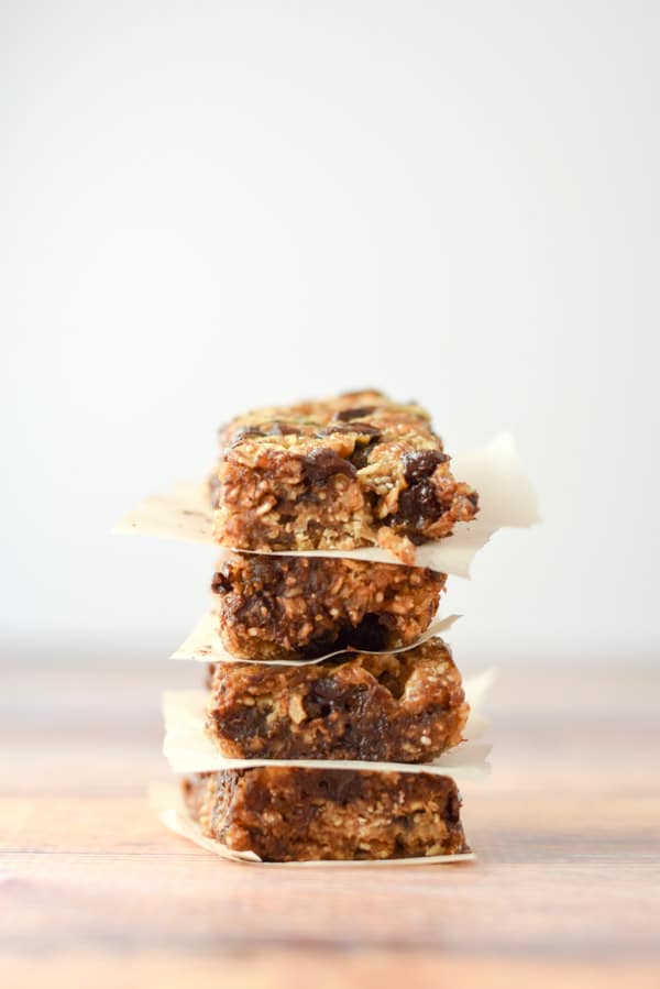 Vertical view of the granola bars stacked with paper between them