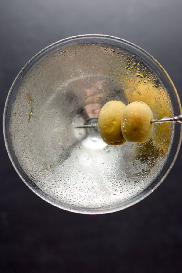 Overhead view for of olives in a martini
