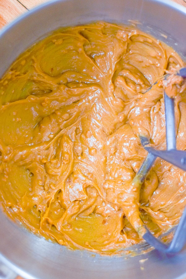 Peanut butter mixed with butter and sugar in a stand mixer
