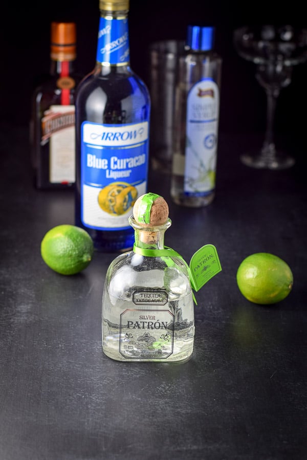 Tequila, lime, blue curacao, simple syrup and Cointreau