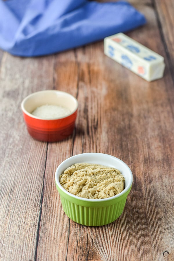sugars and butter on a wooden table