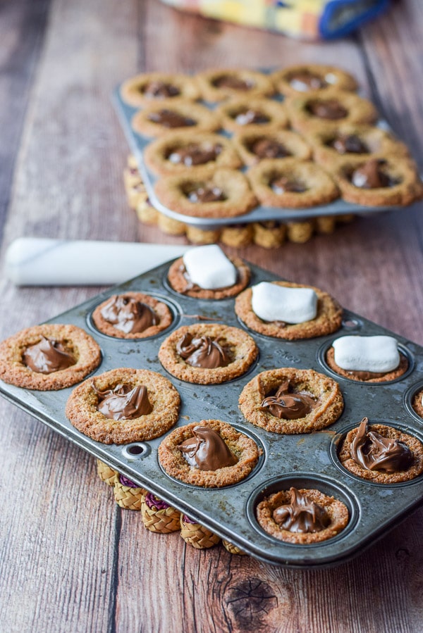 Nutella dolloped in the cookie muffins and a few marshmallows on top