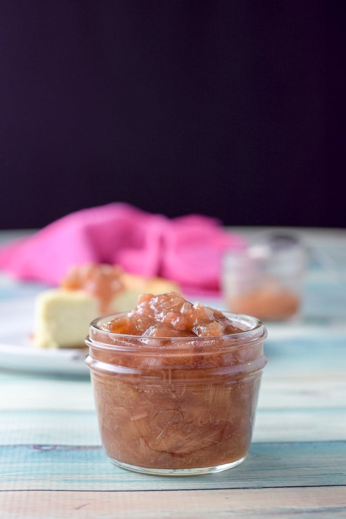 Vertical view of a one cup Ball jar heaped with rhubarb sauce