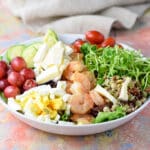 Slices of brie cheese and grapes added to the salad - square