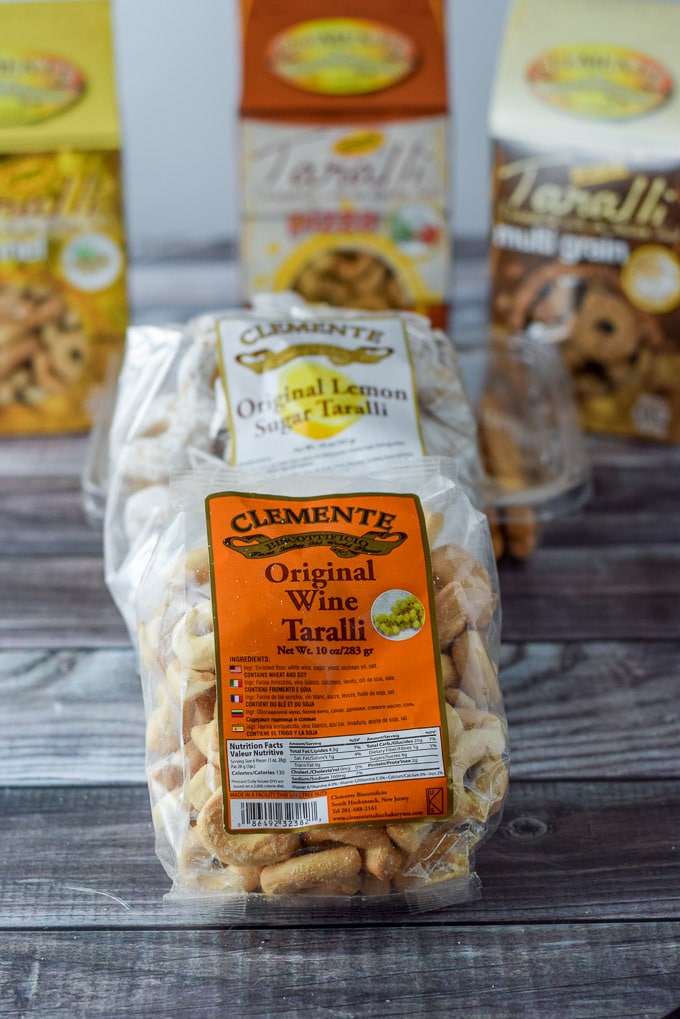 The original wine Tarralli cookies in front of the rest of the packages