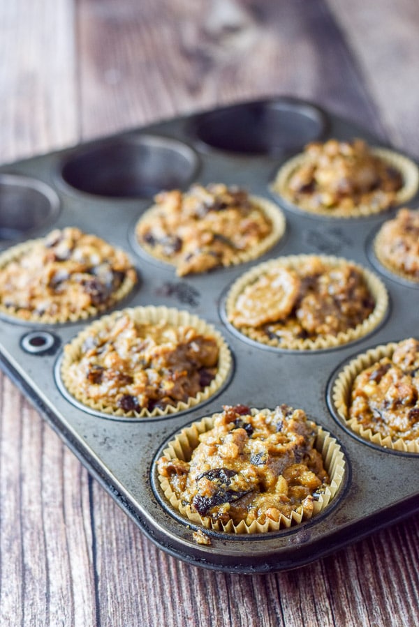 Date muffin batter in the pan ready to be baked