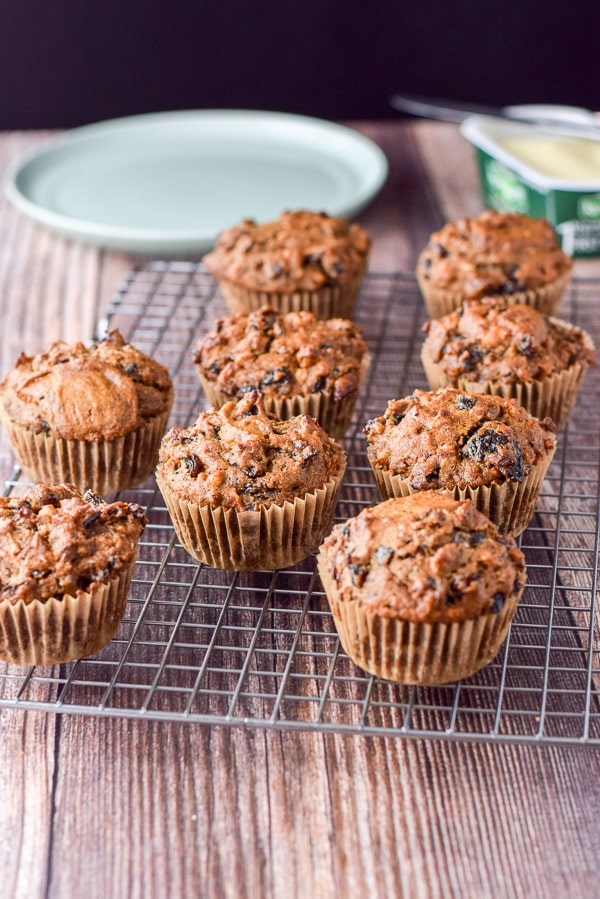 Date muffins fresh out of the oven and cooling on a wire rack