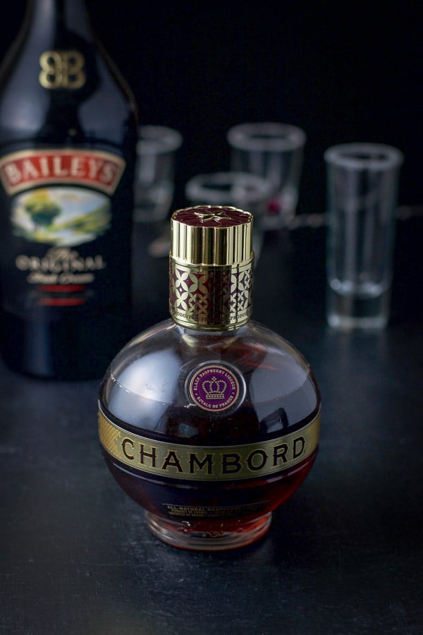 Chambord and Baileys with the shot glasses in the background