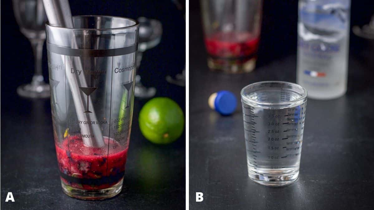 A shaker filled with muddled mint and blueberry and vodka measured out with the bottle in the background
