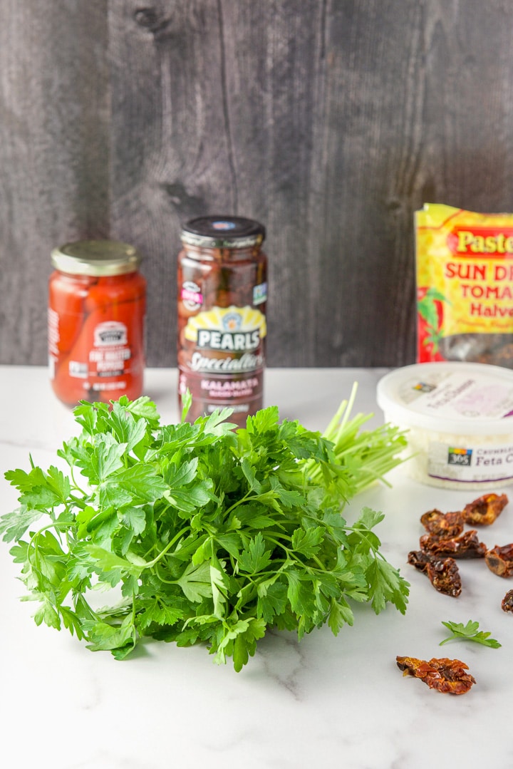 Parsley, sun dried tomatoes, roasted red pepper, olives and feta for salad