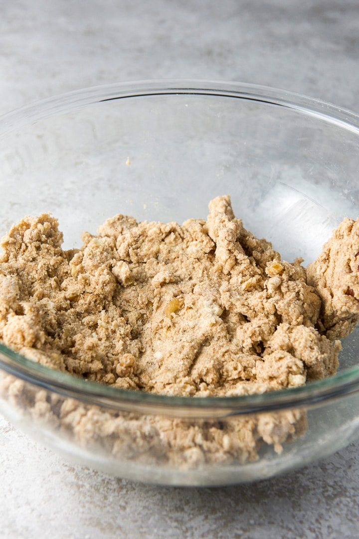 Scones dough mixed together in a glass bowl