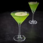 Sour apple cocktail in the classic martini glass