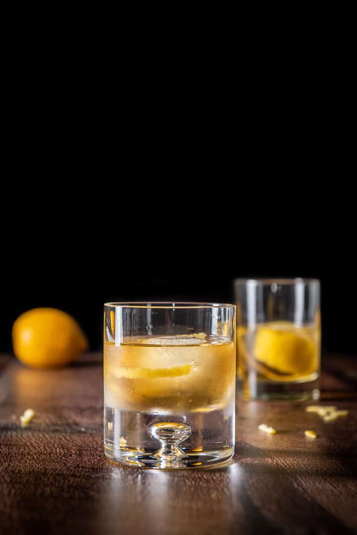Vertical view of the glasses filled with the rusty nail