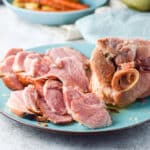 Slices of smoked pork shoulder on the platter