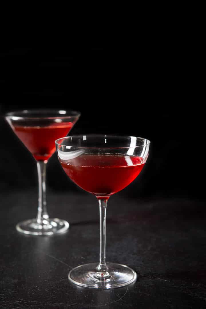 A further view of the bowl glass filed with the Manhattan with the classic glass behind it