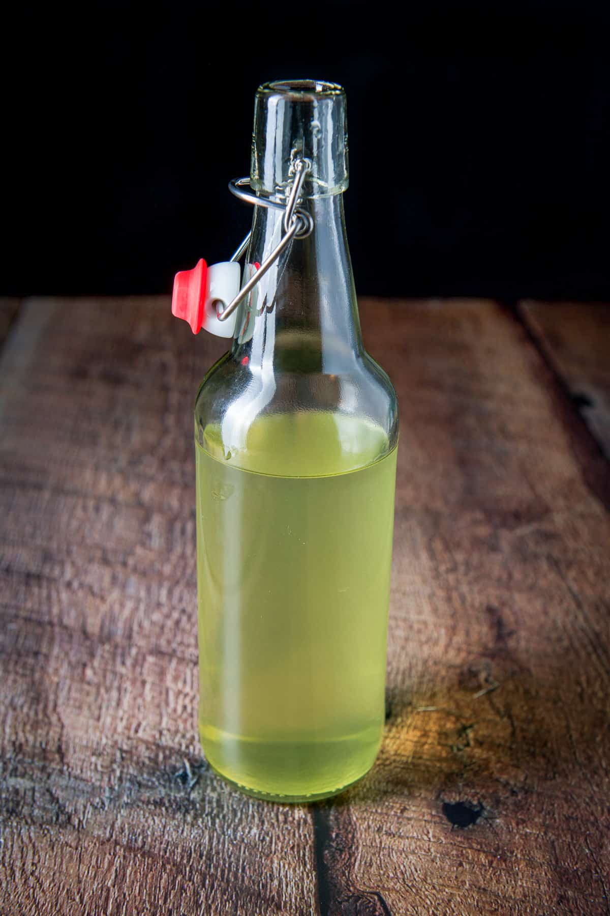 A bottle with the lemon vodka in it