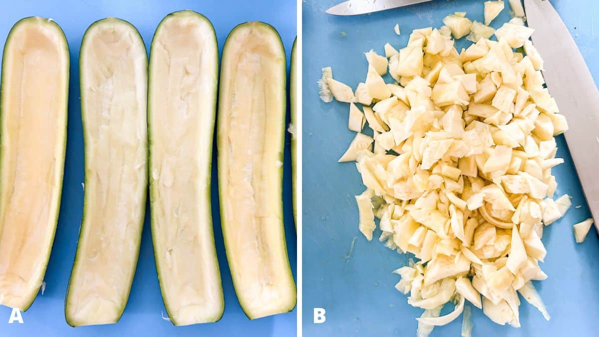 Halved zucchini hollowed out with the chopped meat of the vegetable on the board