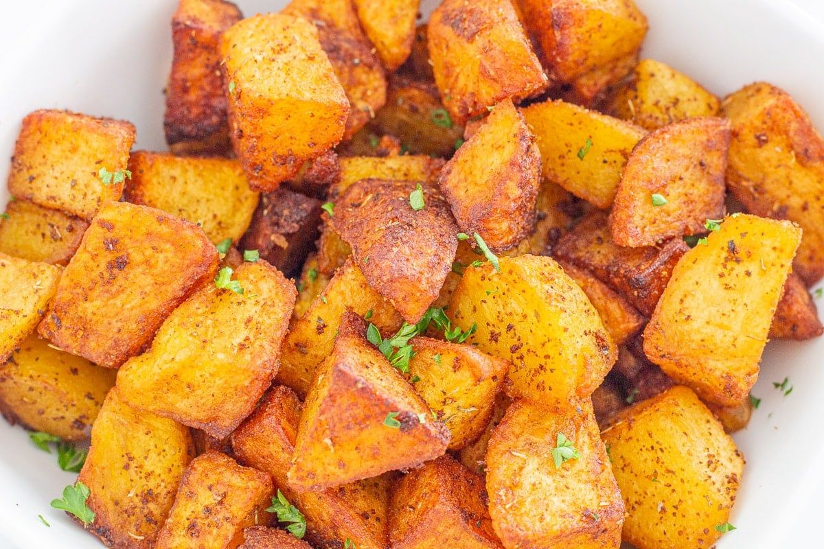 Sliced potatoes on a white background