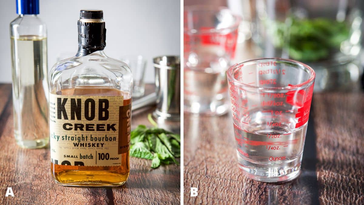 Bottles of bourbon and simple sugar along with fresh mint and glassware on the table
